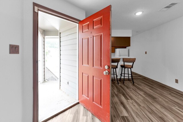 entryway featuring hardwood / wood-style flooring