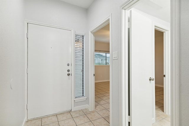 view of tiled foyer entrance