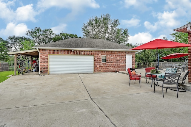 exterior space featuring a carport