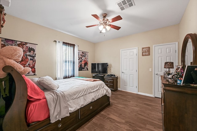 bedroom featuring ceiling fan and hardwood / wood-style floors