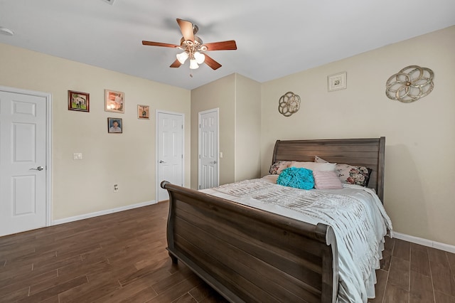 bedroom featuring dark hardwood / wood-style floors and ceiling fan