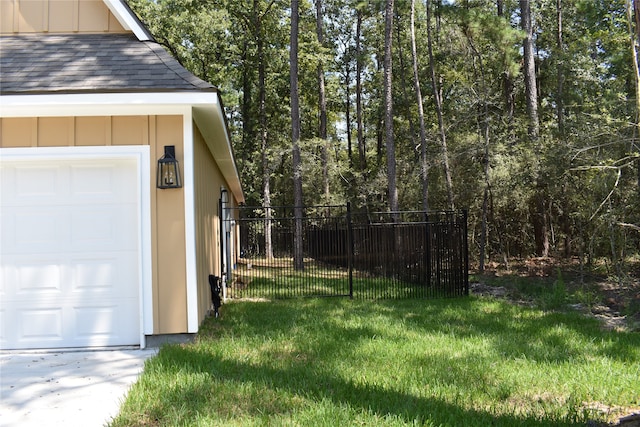 view of yard with a garage