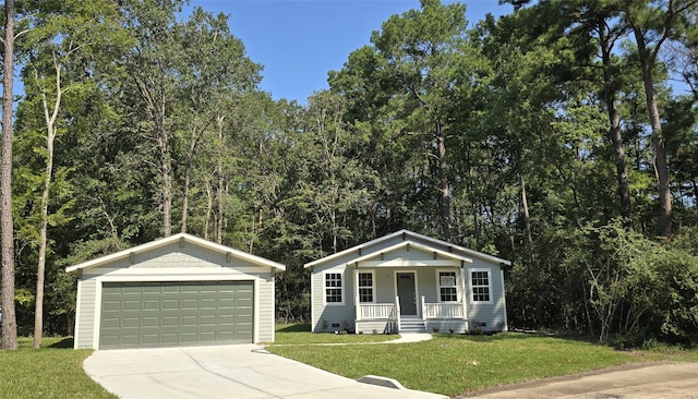 view of front facade with an outdoor structure, a garage, a porch, and a front lawn