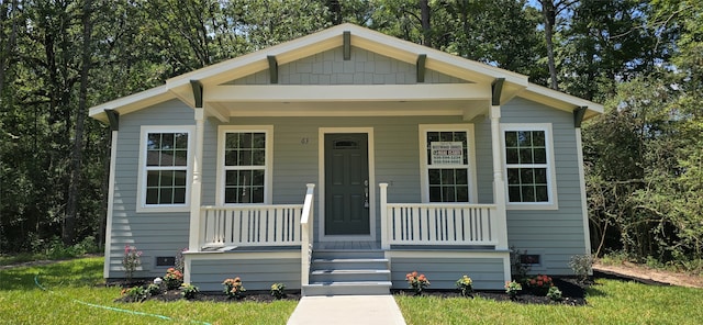 bungalow-style home with a porch