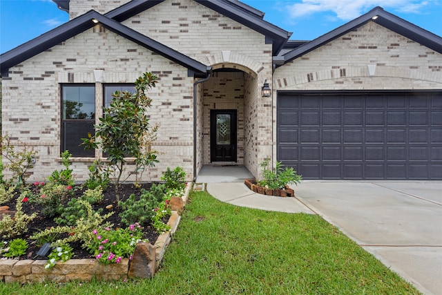 french country style house with a garage and a front yard