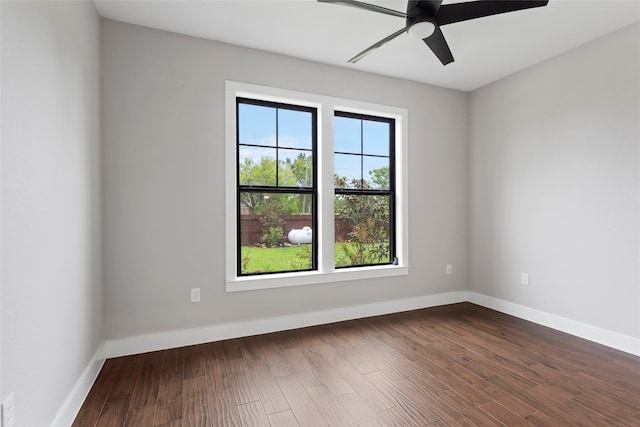 spare room with wood-type flooring and ceiling fan