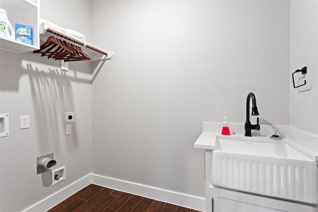 laundry area with hookup for a washing machine, dark wood-type flooring, and hookup for an electric dryer