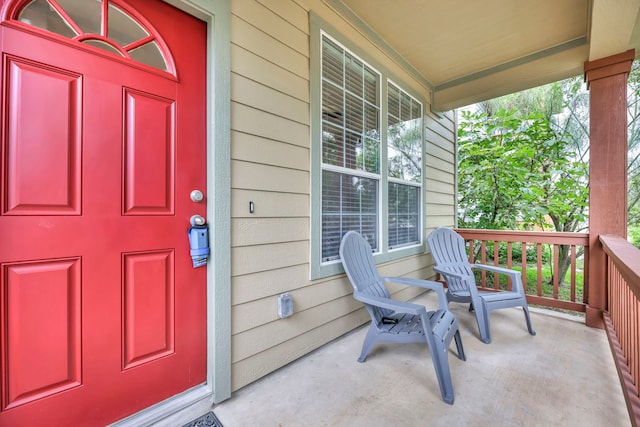 entrance to property with a porch