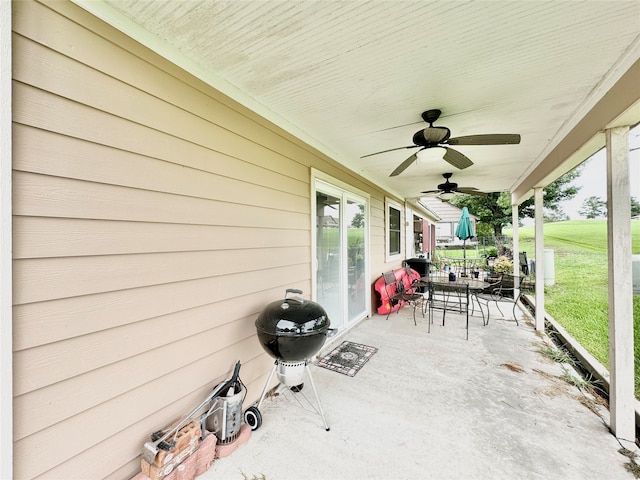 exterior space with ceiling fan