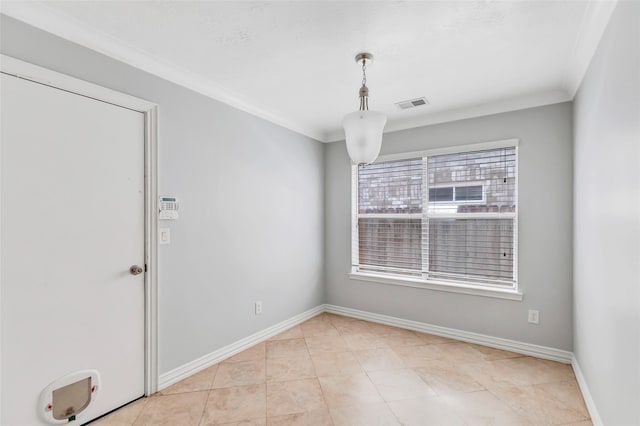 unfurnished room with crown molding and light tile patterned flooring