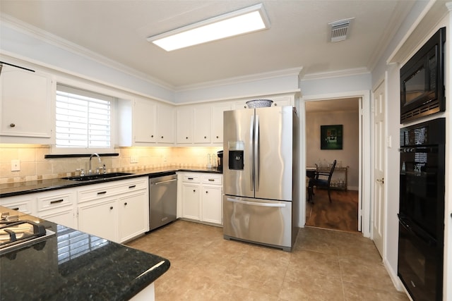 kitchen featuring white cabinetry, ornamental molding, sink, and black appliances