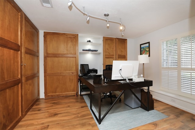 office featuring hardwood / wood-style floors