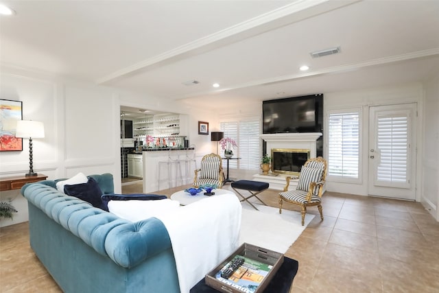 tiled living room with crown molding