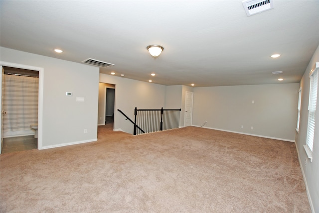 basement with light carpet