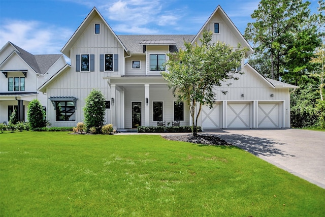 411 N Copa Palm Loop, Montgomery, TX 77316 - modern farmhouse featuring driveway, board and batten siding, roof with shingles, covered porch, and a front lawn