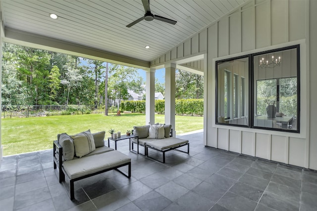 view of patio with an outdoor living space and ceiling fan