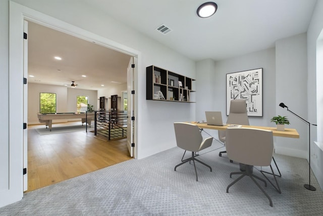 office featuring recessed lighting, wood finished floors, and visible vents