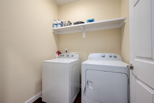 laundry area featuring separate washer and dryer