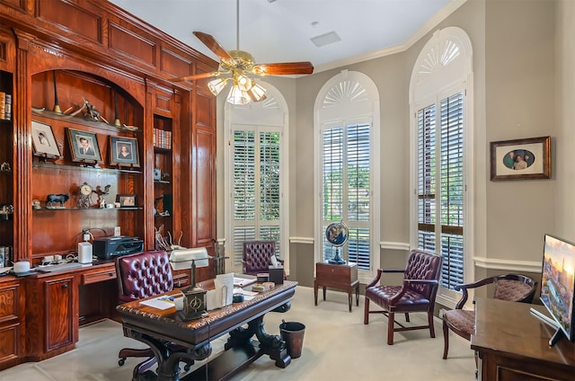 22222 Holly Creek Trl, Tomball, TX 77377 - office space featuring a ceiling fan, ornamental molding, light colored carpet, and built in desk