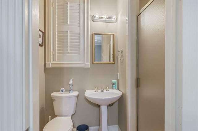 22222 Holly Creek Trl, Tomball, TX 77377 - full bath with a shower stall, toilet, and a sink