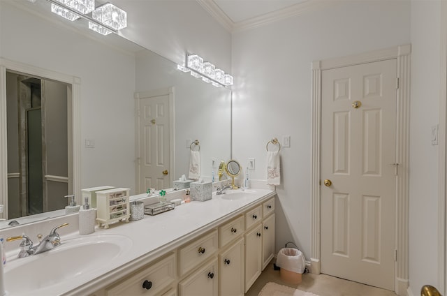 bathroom with crown molding and vanity