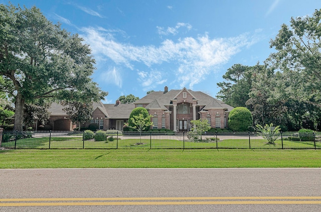 view of front of house with a front lawn