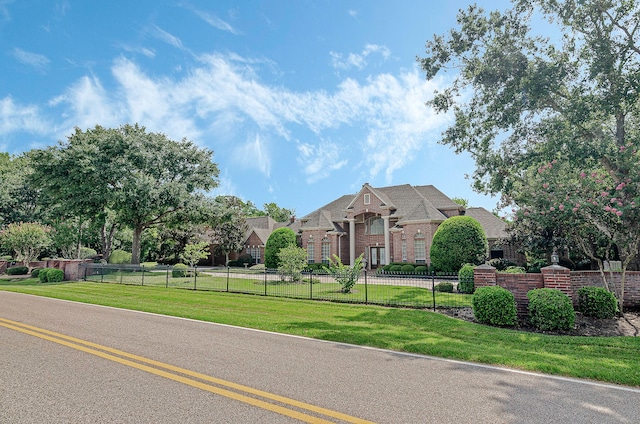 view of front of home with a front lawn