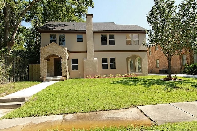 view of front of home with a front yard