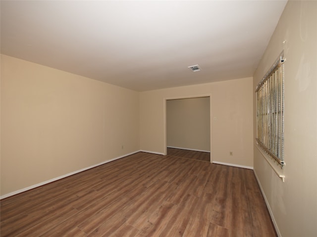 empty room featuring hardwood / wood-style floors