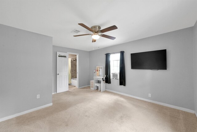 carpeted empty room with cooling unit and ceiling fan