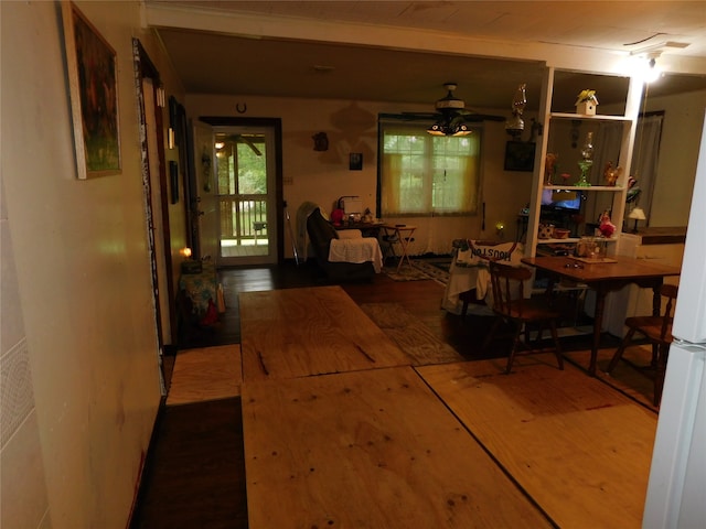 dining room featuring ceiling fan and hardwood / wood-style floors