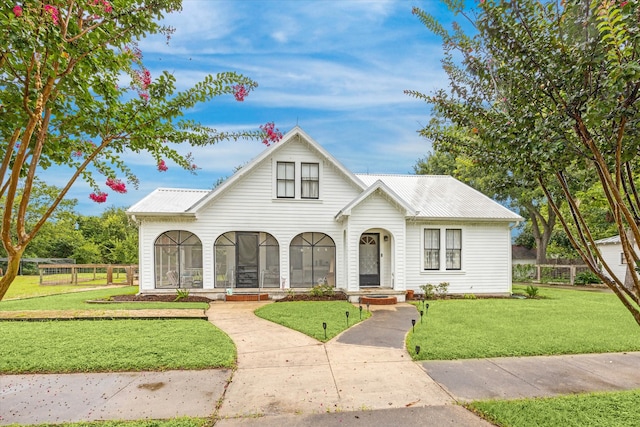 view of front of home with a front yard