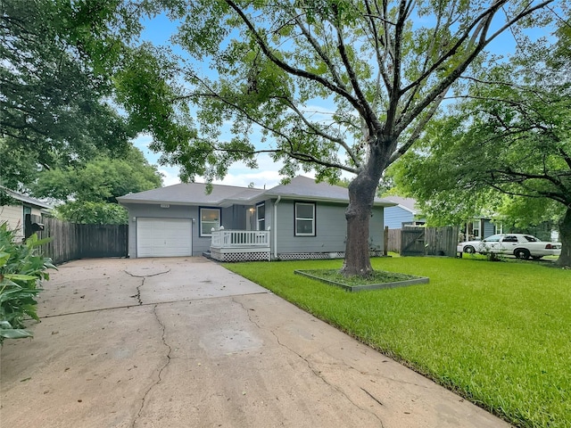 ranch-style house with a front lawn and a garage