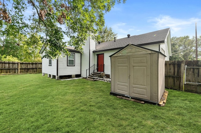 view of outbuilding with a lawn