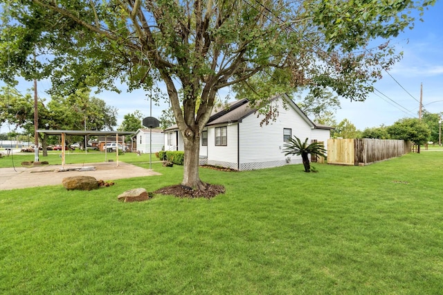 view of yard featuring a carport