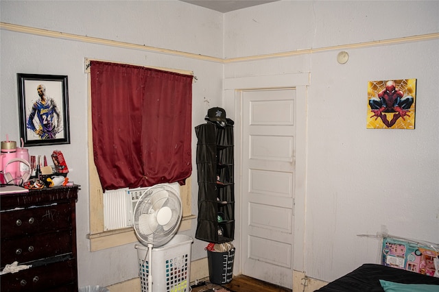 bedroom featuring hardwood / wood-style floors