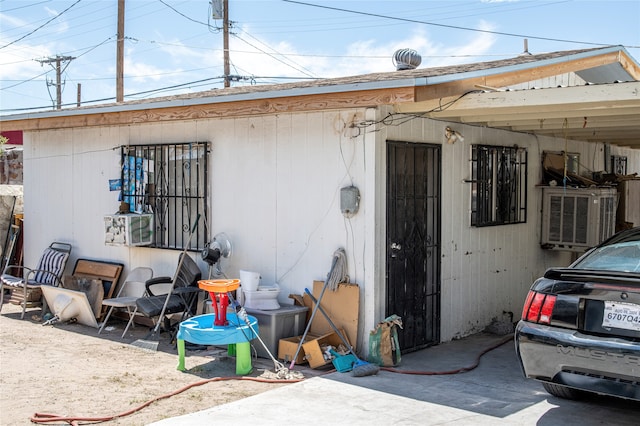 rear view of property featuring a patio area