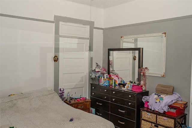 bedroom with a textured ceiling