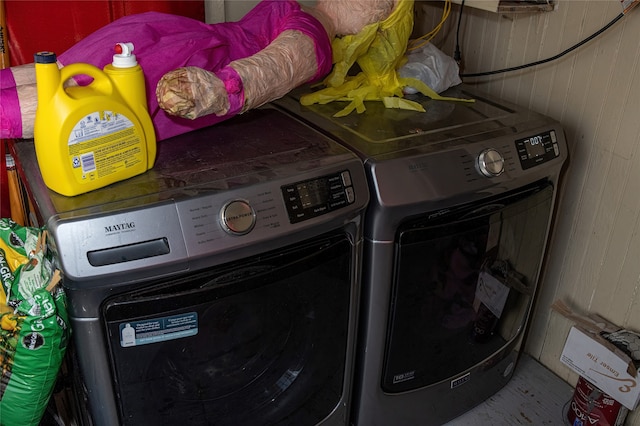 laundry room featuring washing machine and clothes dryer