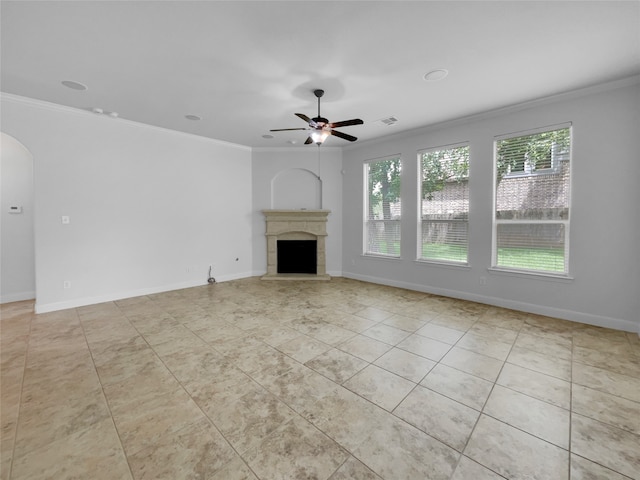 unfurnished living room featuring ornamental molding and light tile patterned flooring