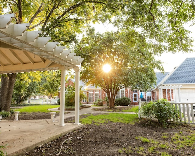 view of yard with a patio and a pergola