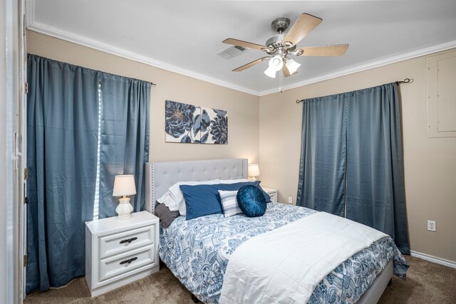 carpeted bedroom featuring ceiling fan and ornamental molding