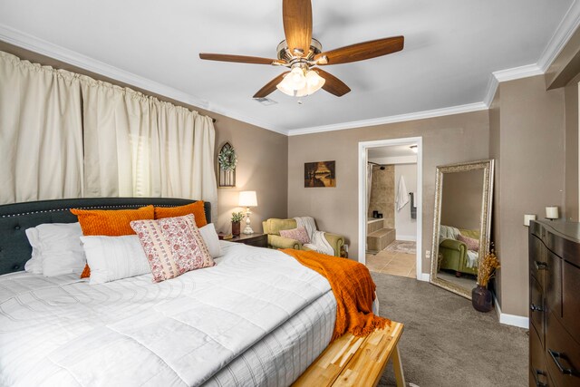 carpeted bedroom featuring crown molding, ensuite bath, and ceiling fan