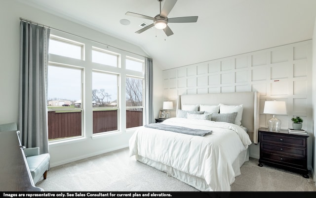 bedroom with light colored carpet, lofted ceiling, and ceiling fan