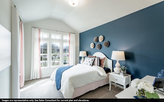 carpeted bedroom featuring vaulted ceiling