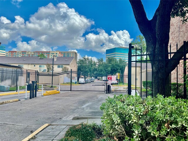 view of gate featuring fence