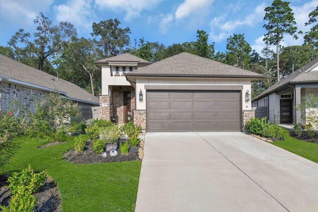 view of front of house with a garage and a front yard