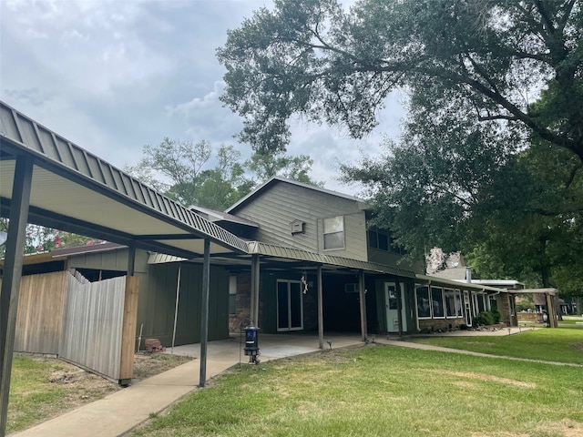 exterior space featuring a patio area and a front yard