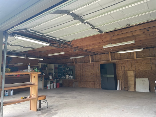 garage with a workshop area