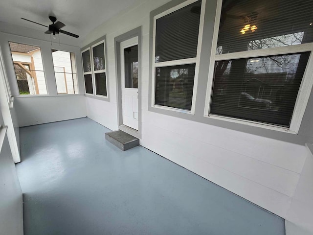 exterior space featuring ceiling fan and covered porch